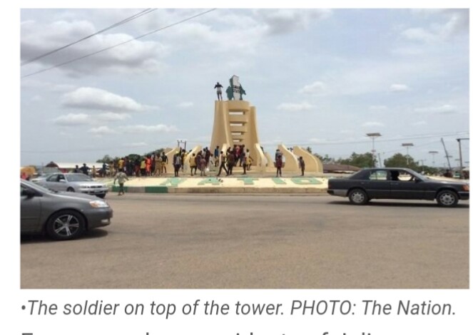 BREAKING: Soldier climbs tower, insists on committing suicide