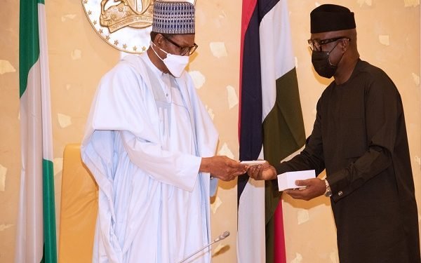 Buhari Receives First Made-In-Nigeria Cell Phone