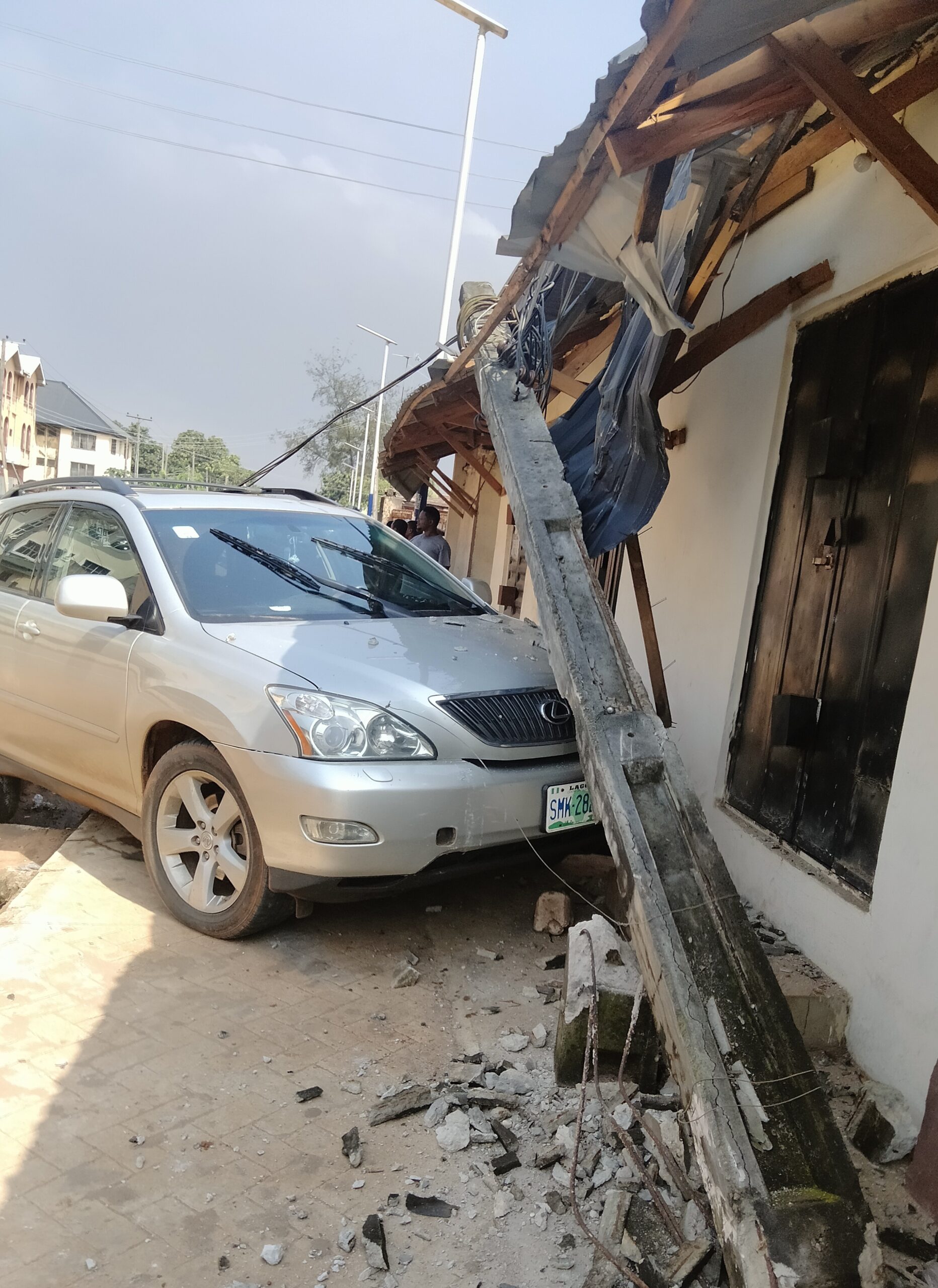 Driver Suspected To Be Suffering From Epilepsy  Loses Control Jumps Gutter, Hit Shop (PHOTOS)