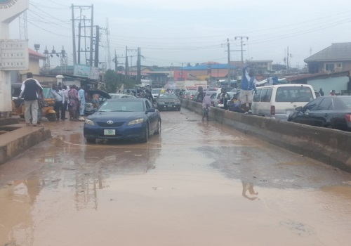 Chaotic! Houses, Vehicles Submerged As Flood Hits Lagos Communities